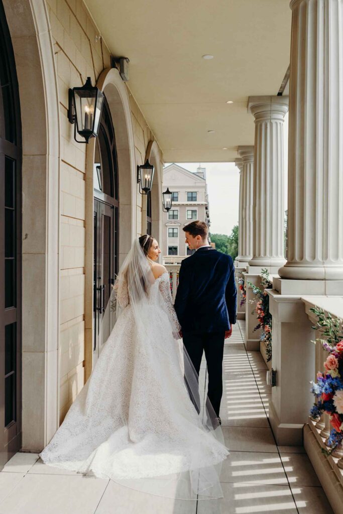 Bride and Groom Hotel Carmichael Outside Balcony revealing downtown Carmel, Indiana