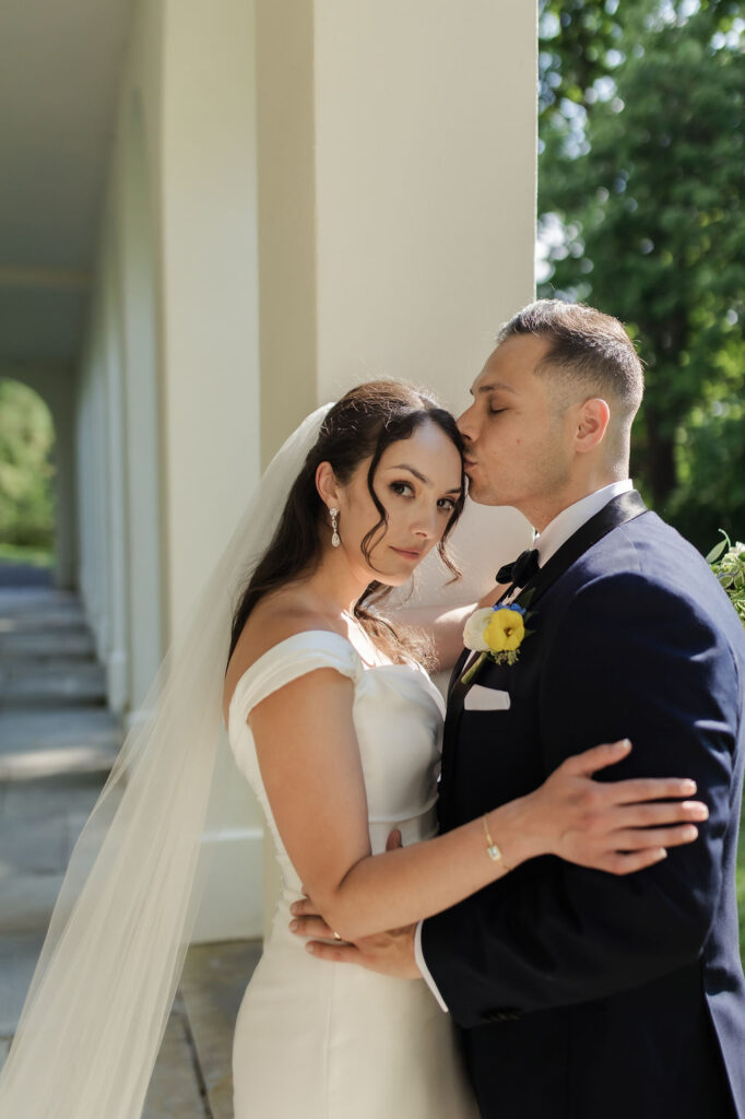 Timeless wedding couple pose giving strong vogue vibes.