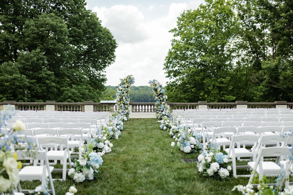 Aisle decorated with beautiful florals by I Do Florals By Sarah at Newfields Indianapolis.