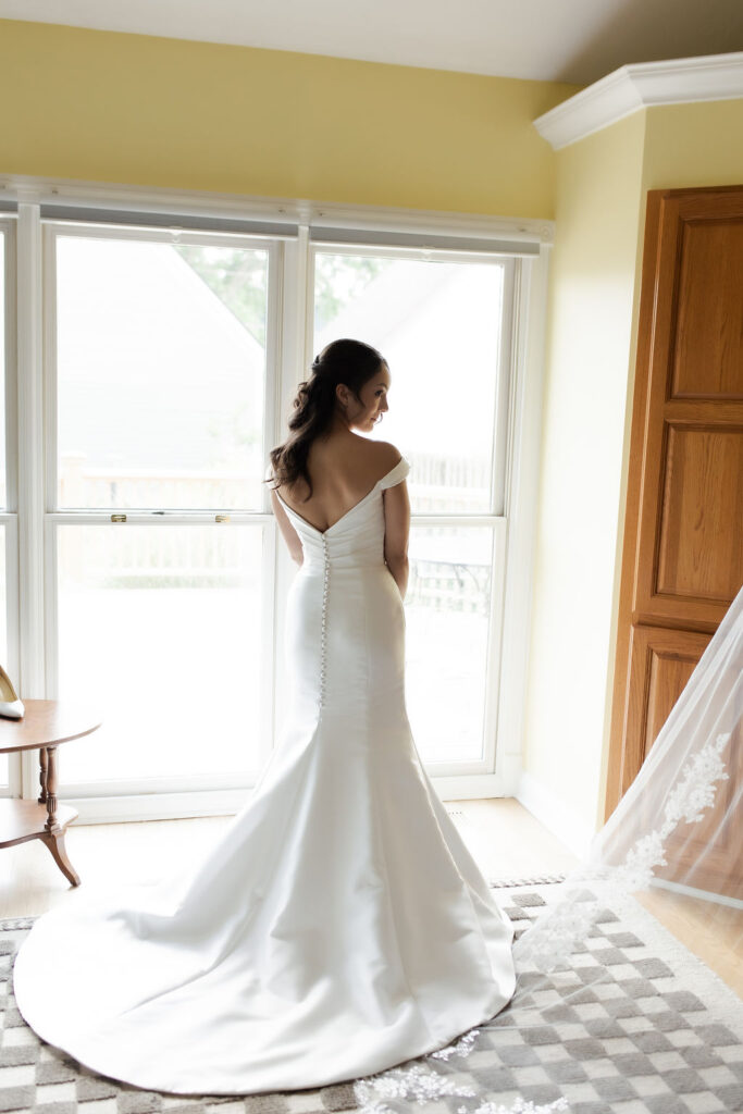 Back of a beautiful bride's wedding dress in Indianapolis.