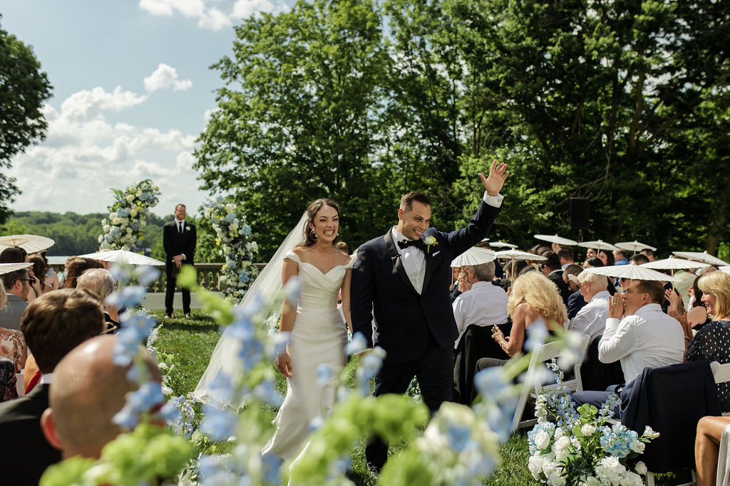 Madalyn & Steve's walking down the aisle as husband and wife at newfields.
