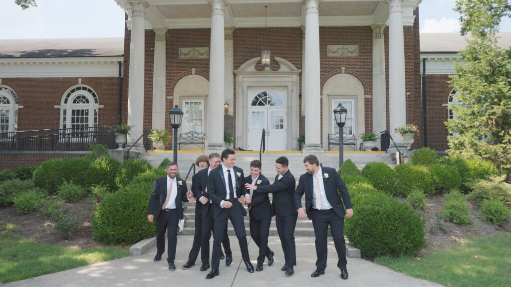 Groom and his groomsmen in front of The Olmsted Louisville Wedding Venue.
