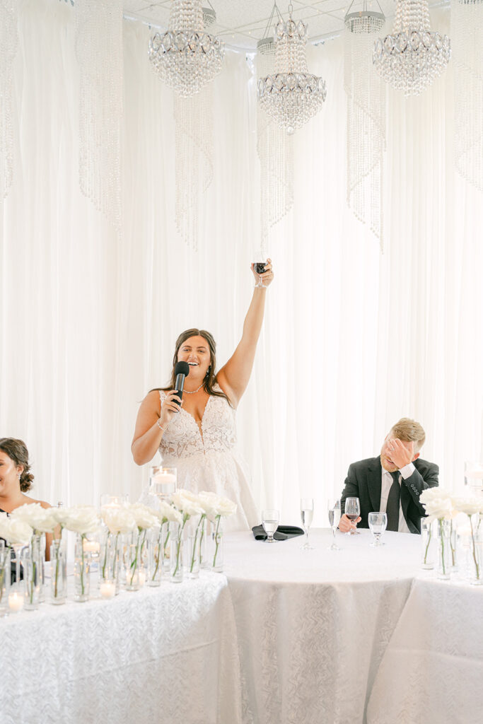 Indianapolis Bride toasting at her wedding captured on video.