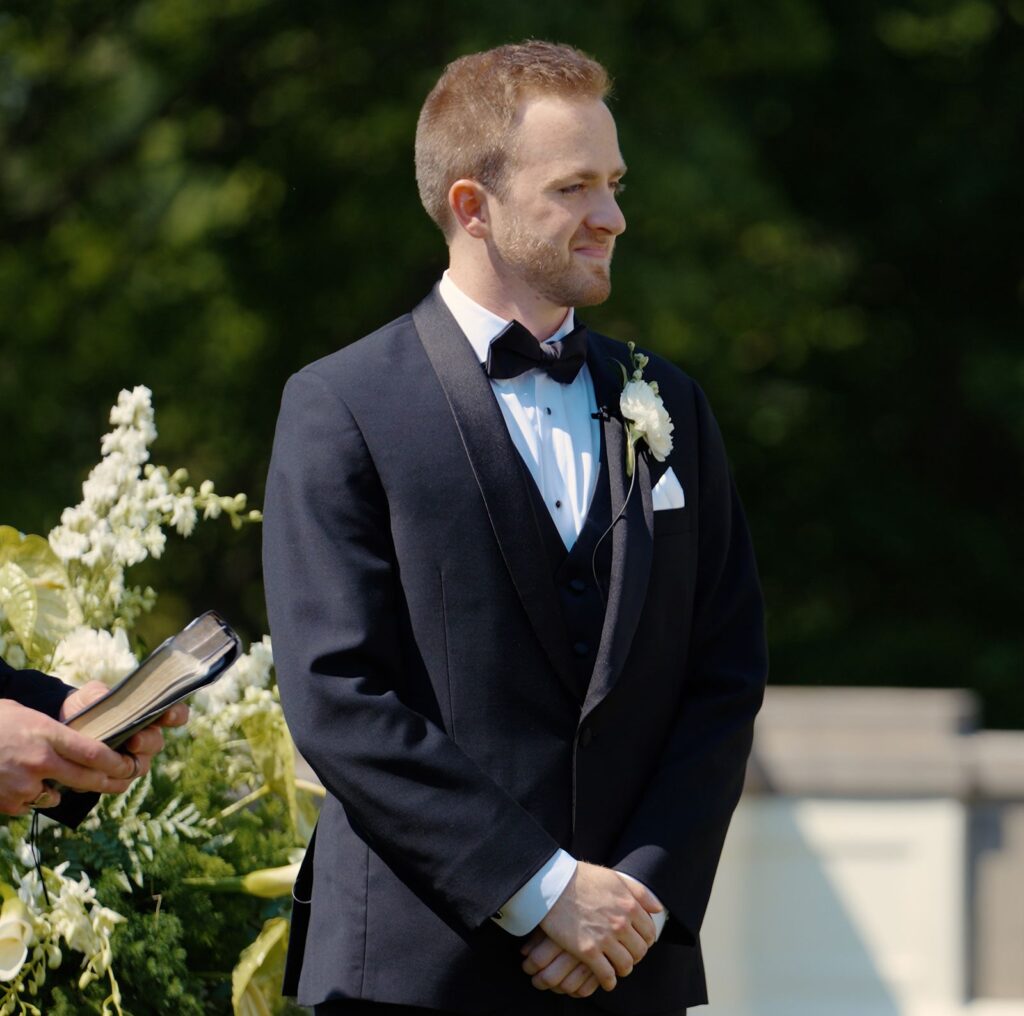 Traditional first look wedding ceremony down the aisle.