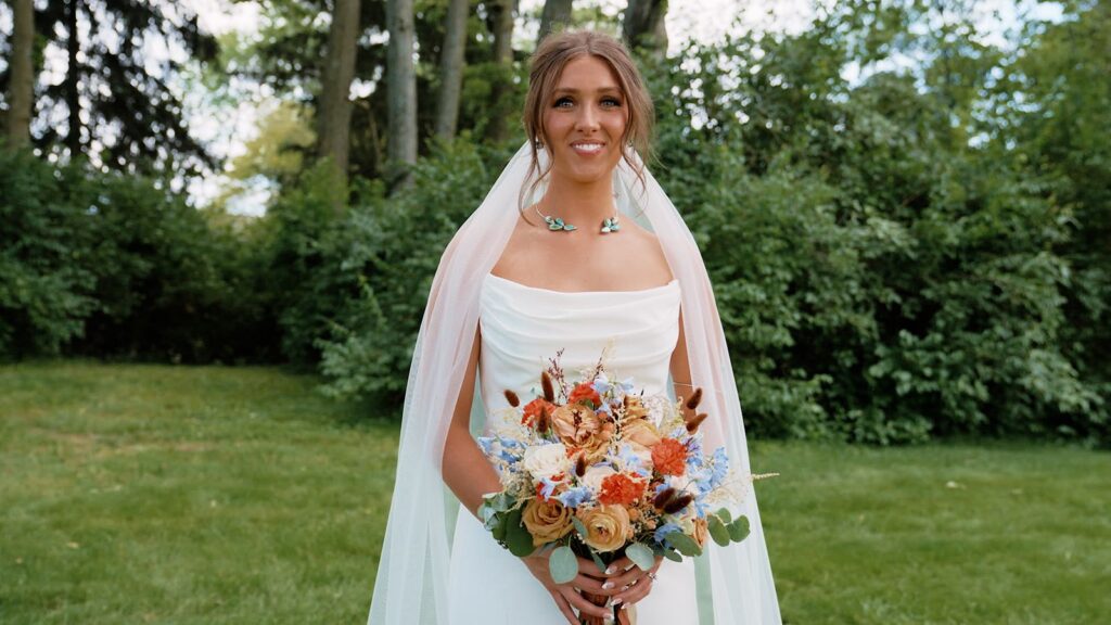 Bridal bouquet vibrant style florals with botanicals.